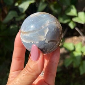 Fossilized (1) chalcedony petrified wood sphere | crystal